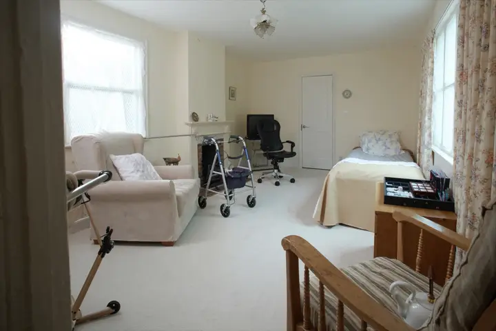 A living room arranged for someone with limited mobility.