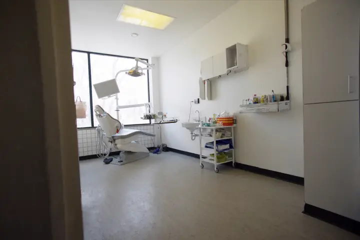An empty dental treatment room.